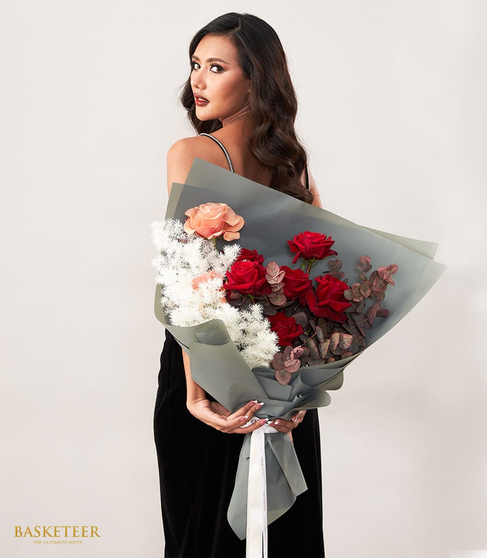 Luxury peach and red rose bouquet with white fillers, wrapped in grey paper with white ribbon