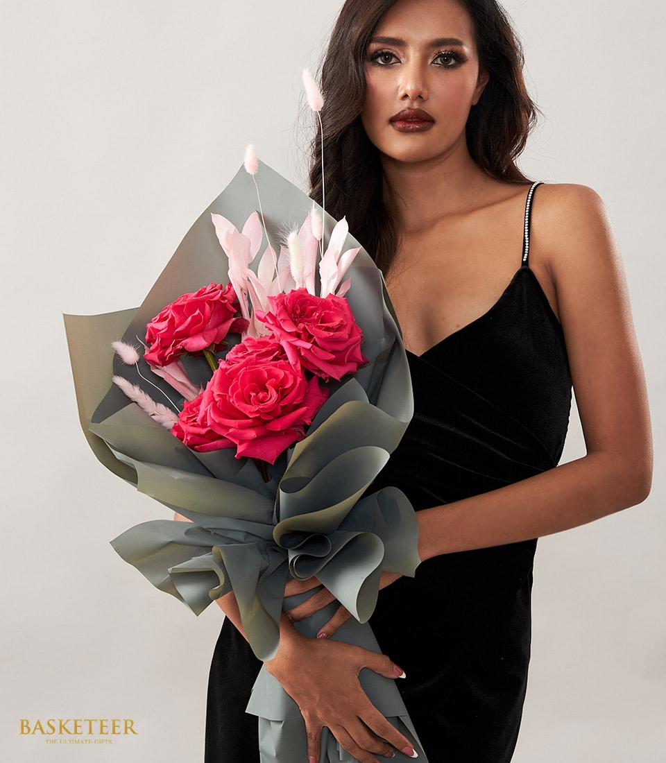 Vibrant pink roses with dried grasses in teal wrap, Valentine's Day bouquet for her