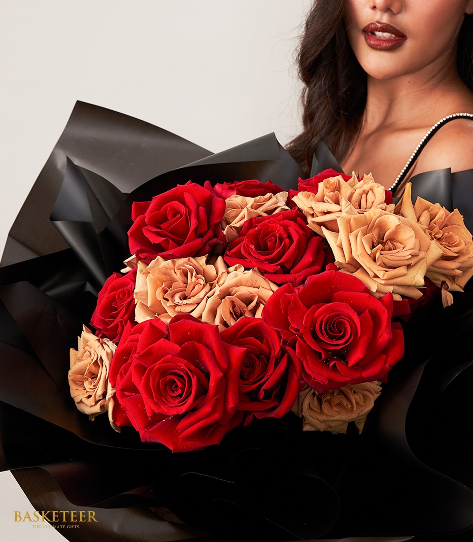 Red and tan roses bouquet wrapped in black paper, anniversary gift for her