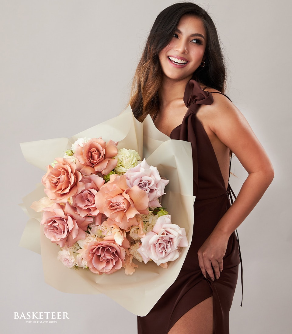 Blooming Toffee Roses Bouquet in dusty rose, peach, and lavender with cream wrap, Valentine's Day flowers for her