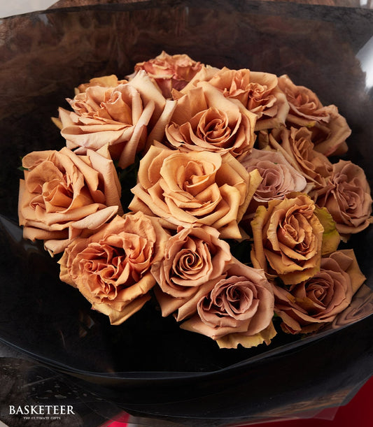Toffee Dream rose bouquet with warm brown and dusty mauve blooms, elegantly wrapped for Valentine's Day
