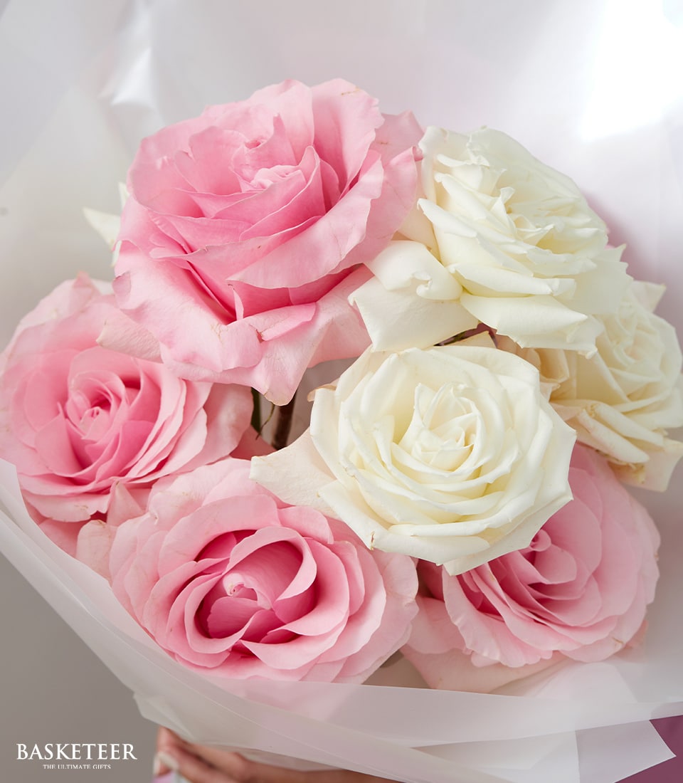 Pink and white rose bouquet with premium Ecuador blooms, wrapped for anniversary gifting