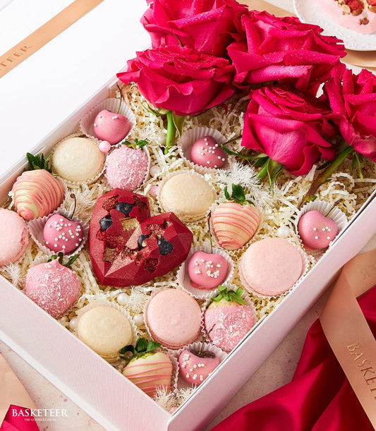 Deluxe red roses and ruby chocolate gift set with macarons and strawberries for Valentine's Day