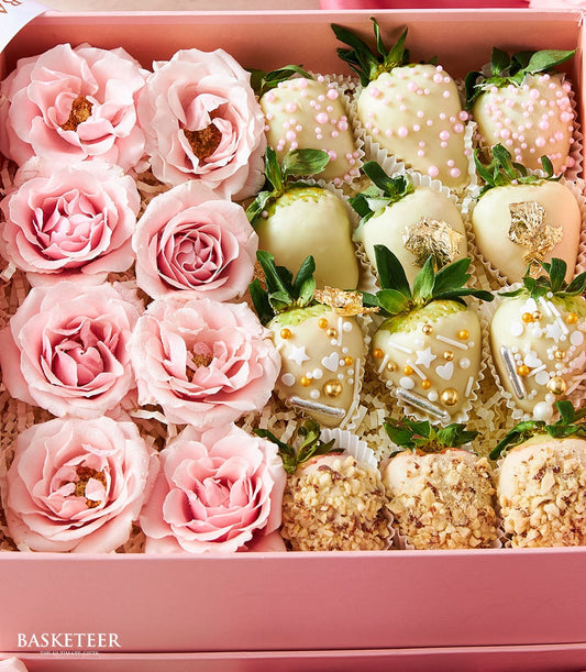 Pink roses and chocolate-covered strawberries in luxury gift box for Valentine's Day
