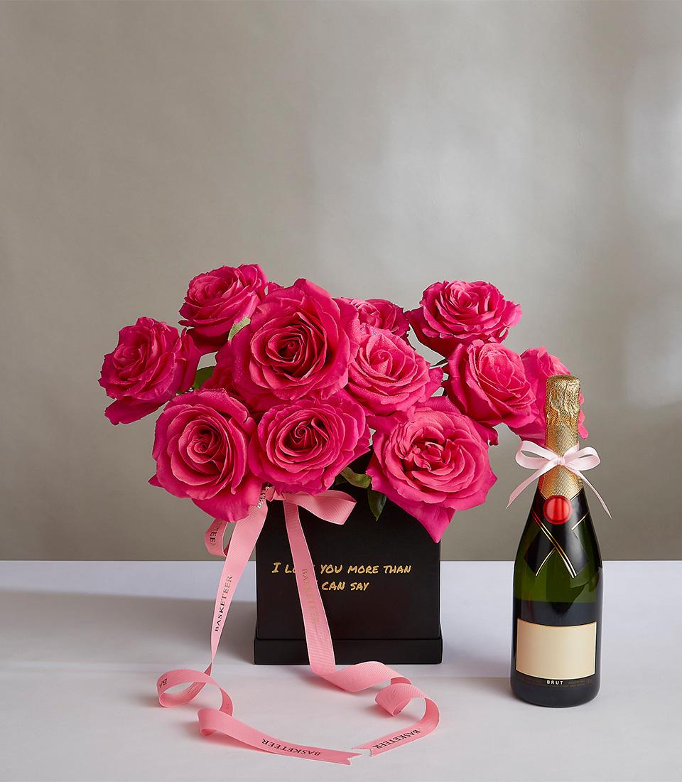 Hot pink roses in black luxury box with champagne bottle, anniversary gift set with gold ribbon