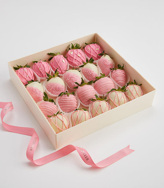 Premium chocolate-covered strawberries gift box with pink and gold decoration, luxury birthday present
