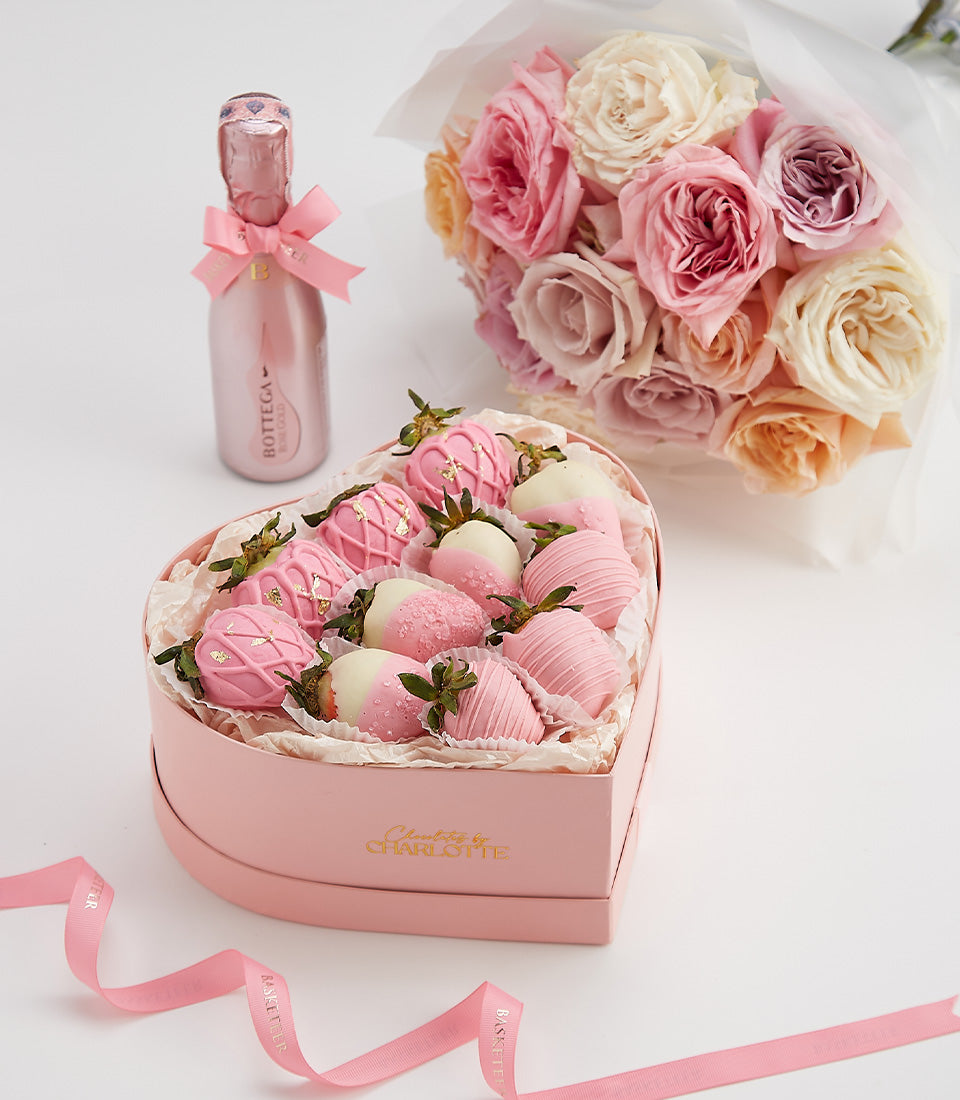 Pink heart chocolate-covered strawberries with rosé, roses, and gold leaf Valentine gift set