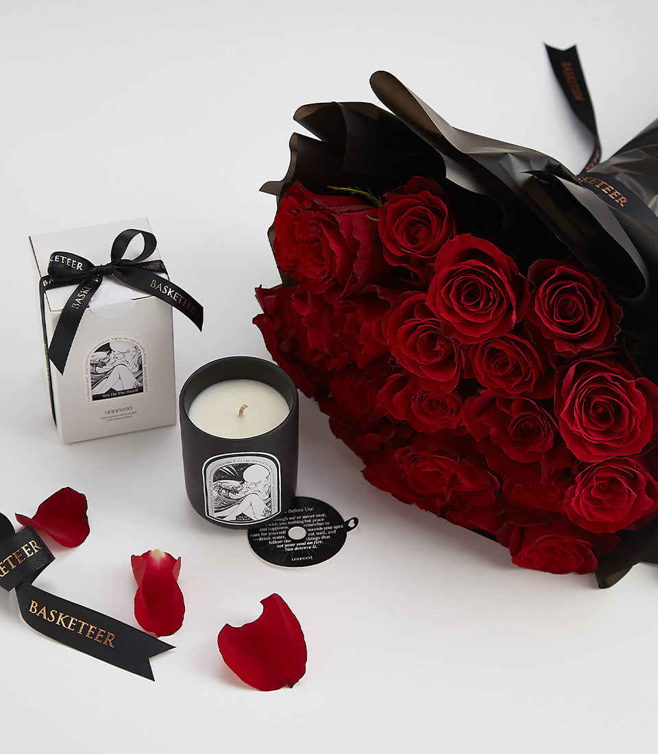 Red roses bouquet with scented candle Valentine's gift set, luxury wrapped with black ribbon and gold accents