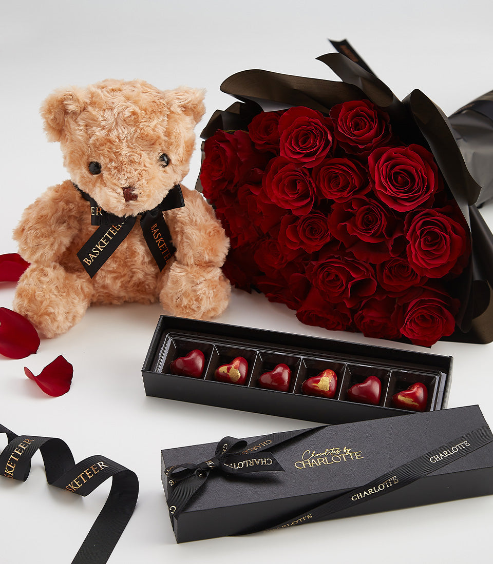 Red roses and teddy bear Valentine's gift set with heart-shaped chocolates
