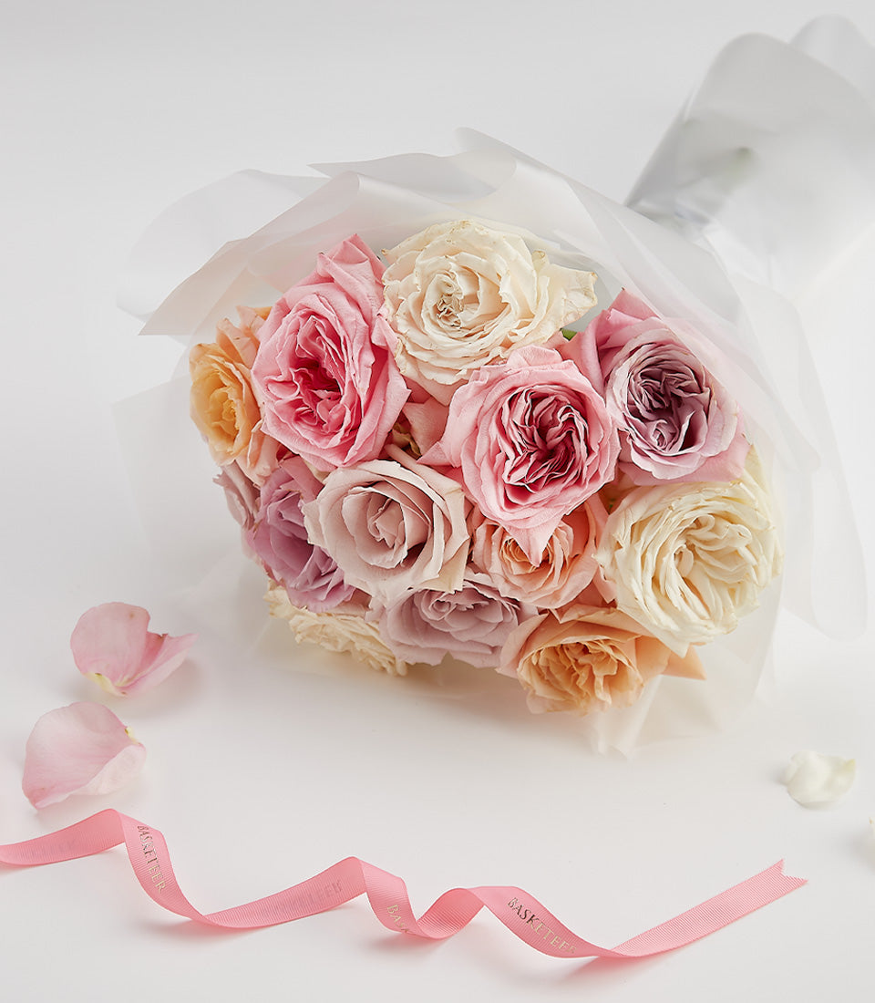 Pastel rose bouquet with teddy bear gift, pink ribbon, Valentine's Day surprise