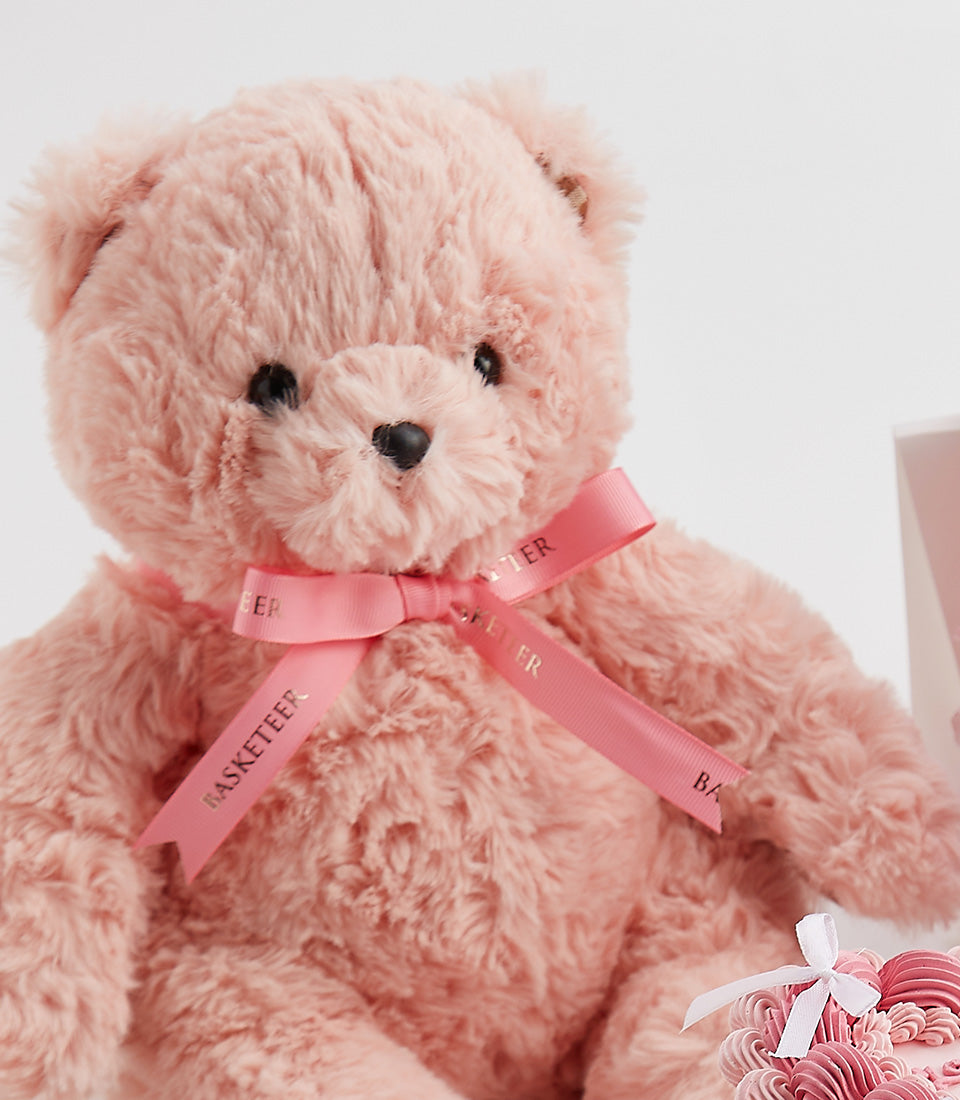 Soft pink teddy bear with satin ribbon bow, Valentine's gift set with gourmet treats