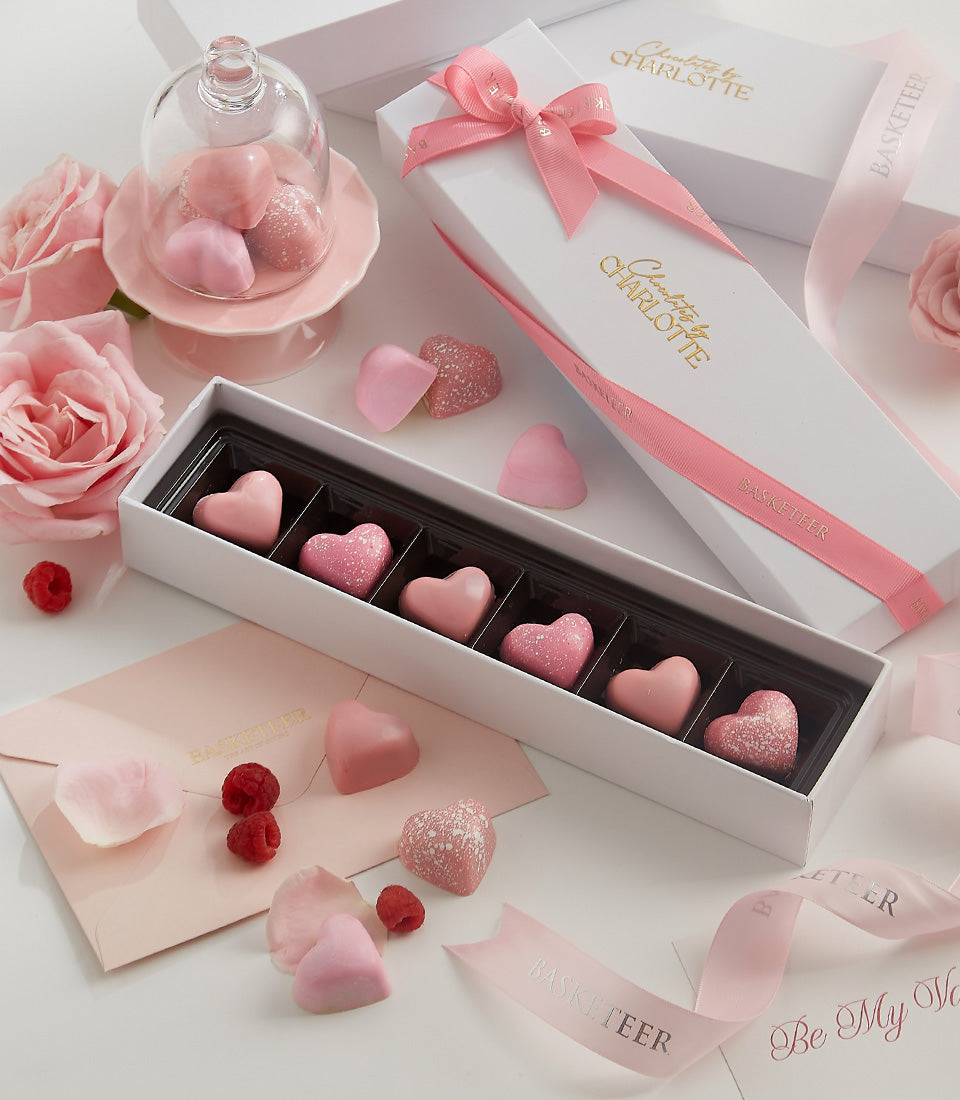 Pink heart-shaped chocolates with teddy bear in white gift box, Valentine's Day luxury chocolate gift hamper