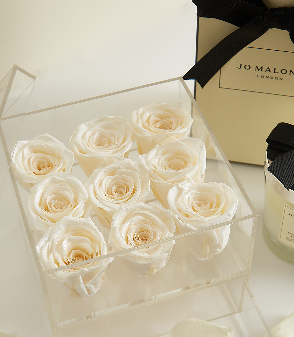 Luxury preserved white roses in acrylic box with Jo Malone candle and fragrance gift set for Valentine's Day