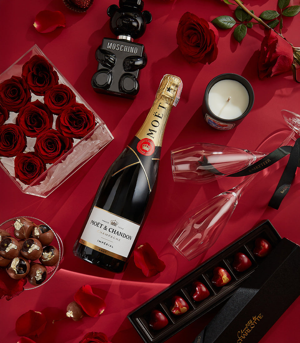 Moët & Chandon champagne with red roses, champagne flutes, chocolates and black candle Valentine's gift set