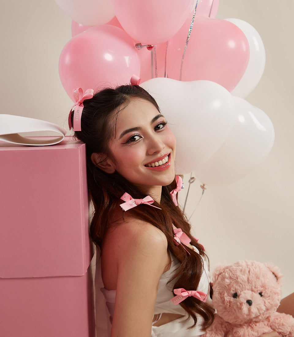 Basketeer Valentine's gift: pink box with teddy bear and balloons. A sweet, same-day gift delivery for someone special in Bangkok.