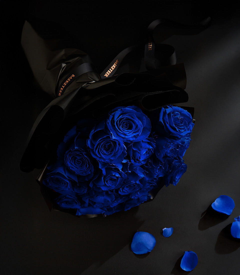 Luxury blue rose bouquet with champagne gift set, elegant black wrapping for Valentine's celebration