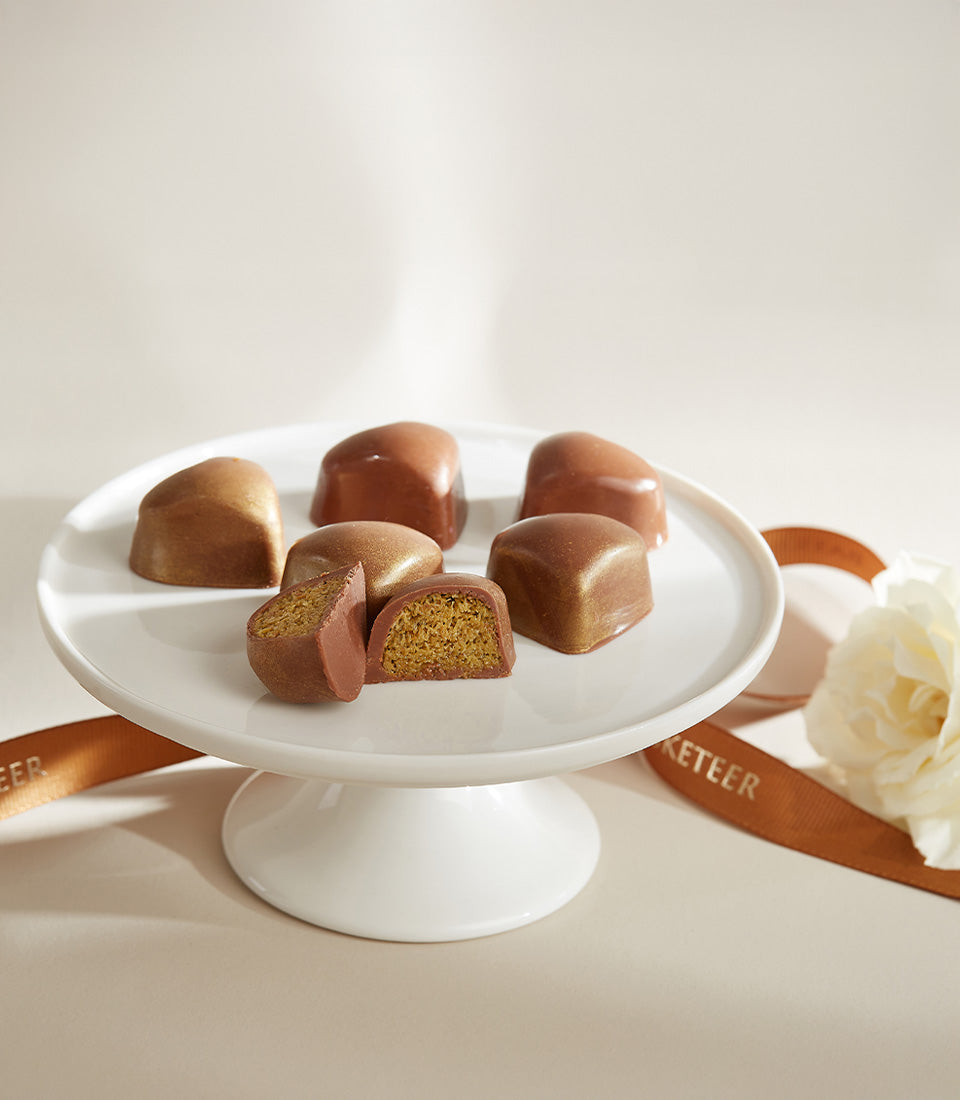 Luxury chocolate truffles with biscuit filling on ceramic stand, Valentine gift set for him