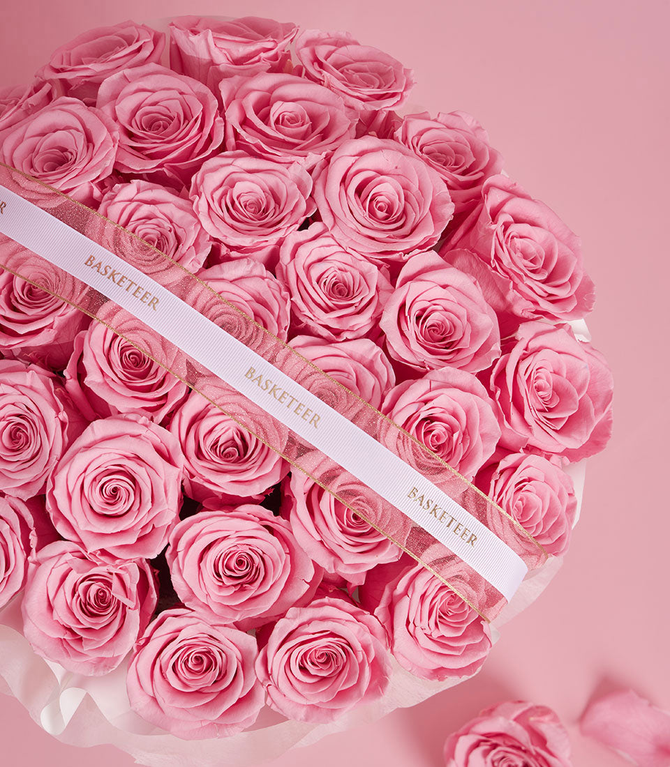 Preserved pink roses arrangement with blush teddy bear Valentine's gift set