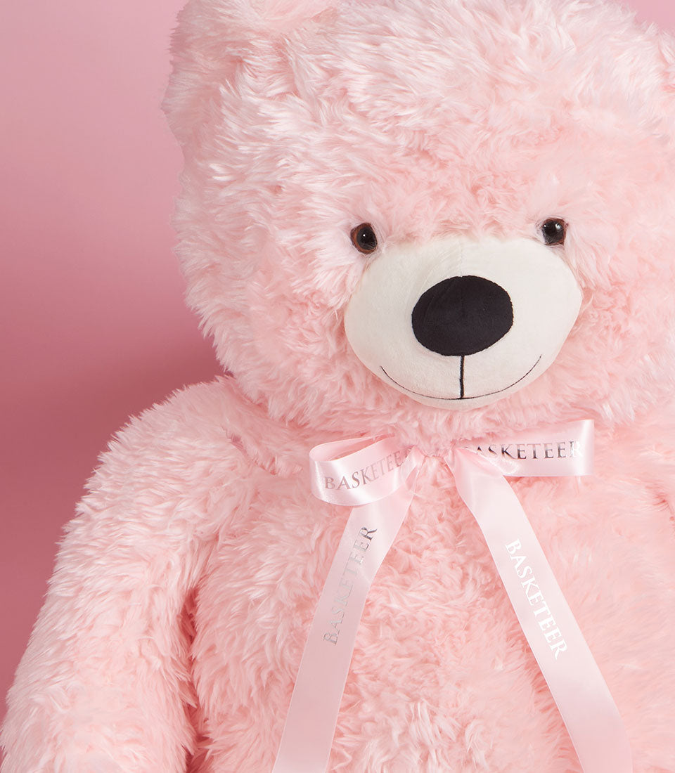 Giant 120cm soft pink plush teddy bear with satin ribbon bow, luxury Valentine's gift hamper accent