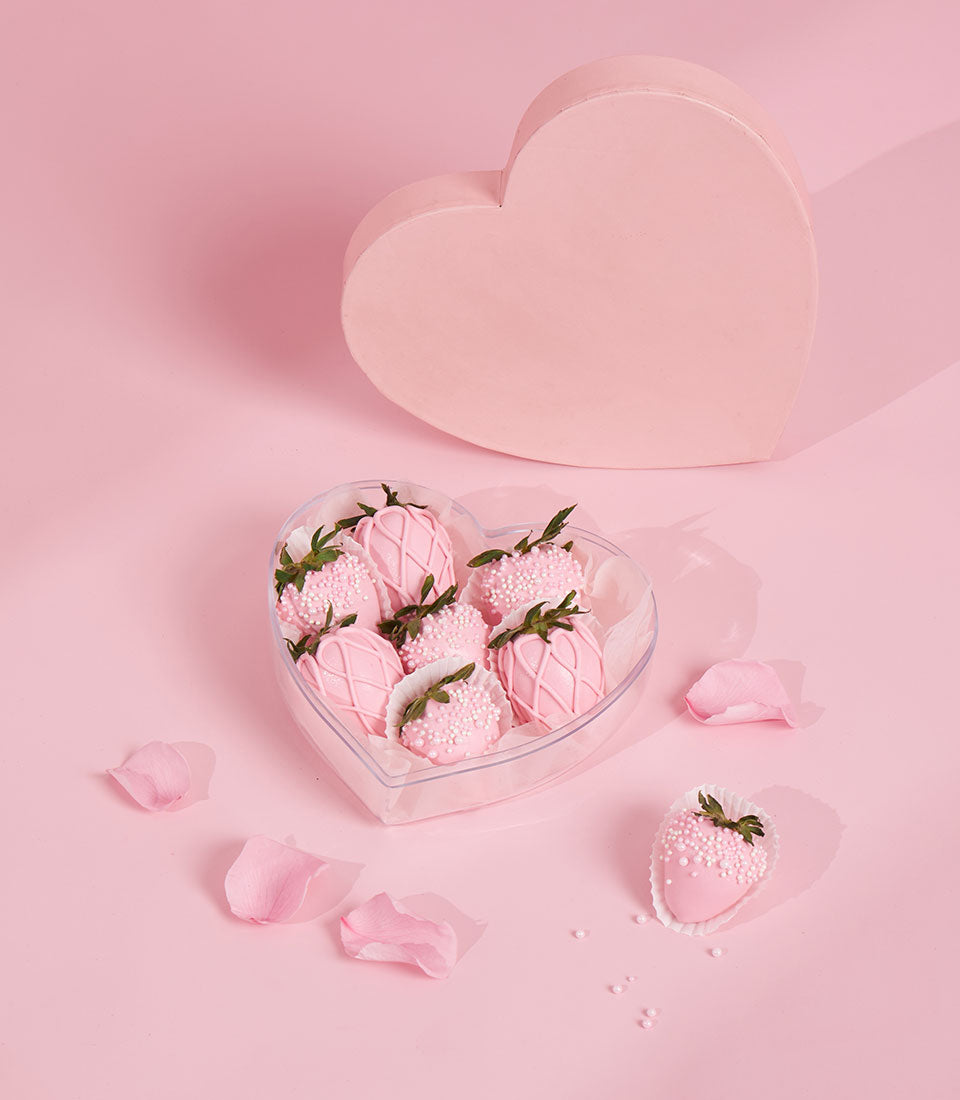 Heart-shaped Valentine chocolate-covered strawberries gift box with pink and white sprinkle designs