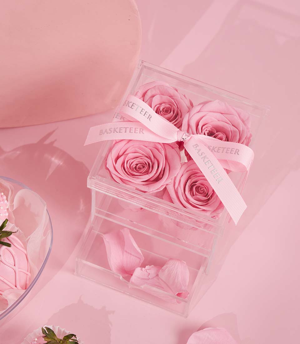 Pink roses and strawberries in tiered gift box with preserved petals, Valentine's Day luxury set