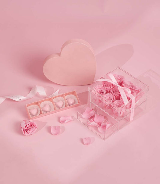 Luxury Valentine's gift set with 9 pink Ecuador roses, raspberry passion bonbons, and heart-shaped chocolates
