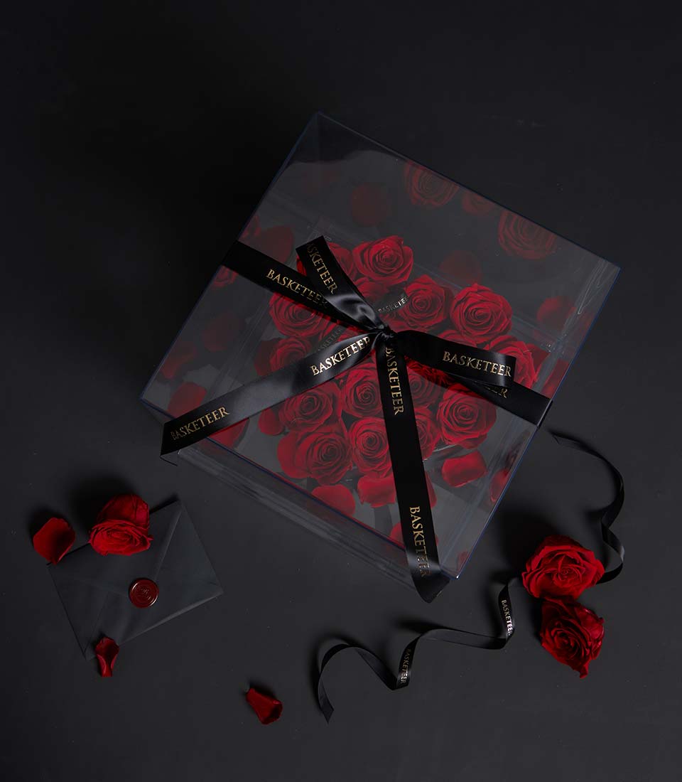 Red preserved roses in heart shape luxury box with black ribbon for Valentine's Day