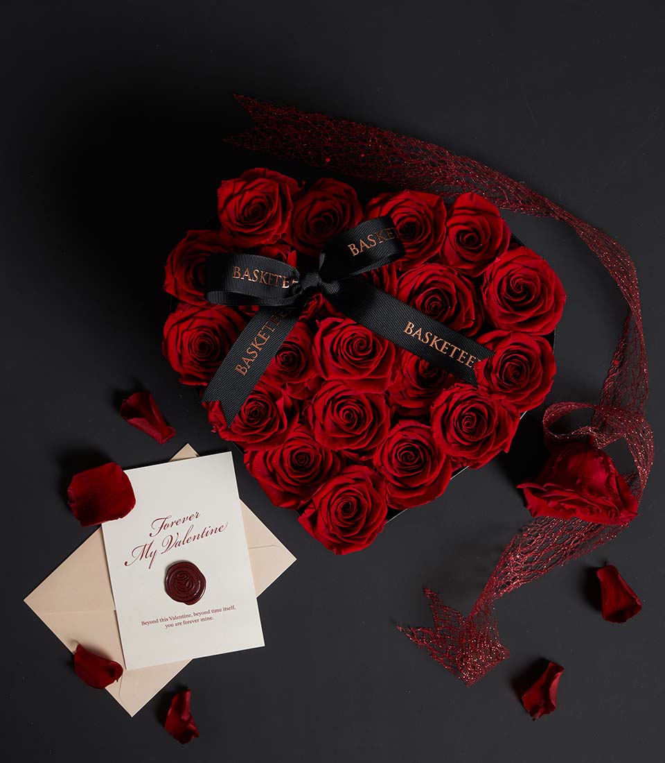 Luxury heart box from Flowers by Basketeer featuring deep red preserved roses and a branded ribbon. Perfect rose bouquet Thailand gift with same-day flower delivery.