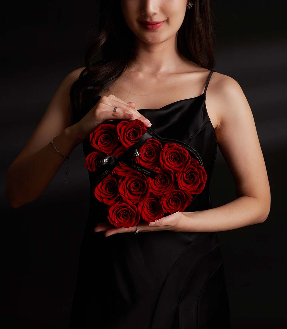 Elegant Flowers by Basketeer heart box with vibrant red preserved roses, a romantic Valentine's gift. Order premium flowers Bangkok for same-day flower delivery.