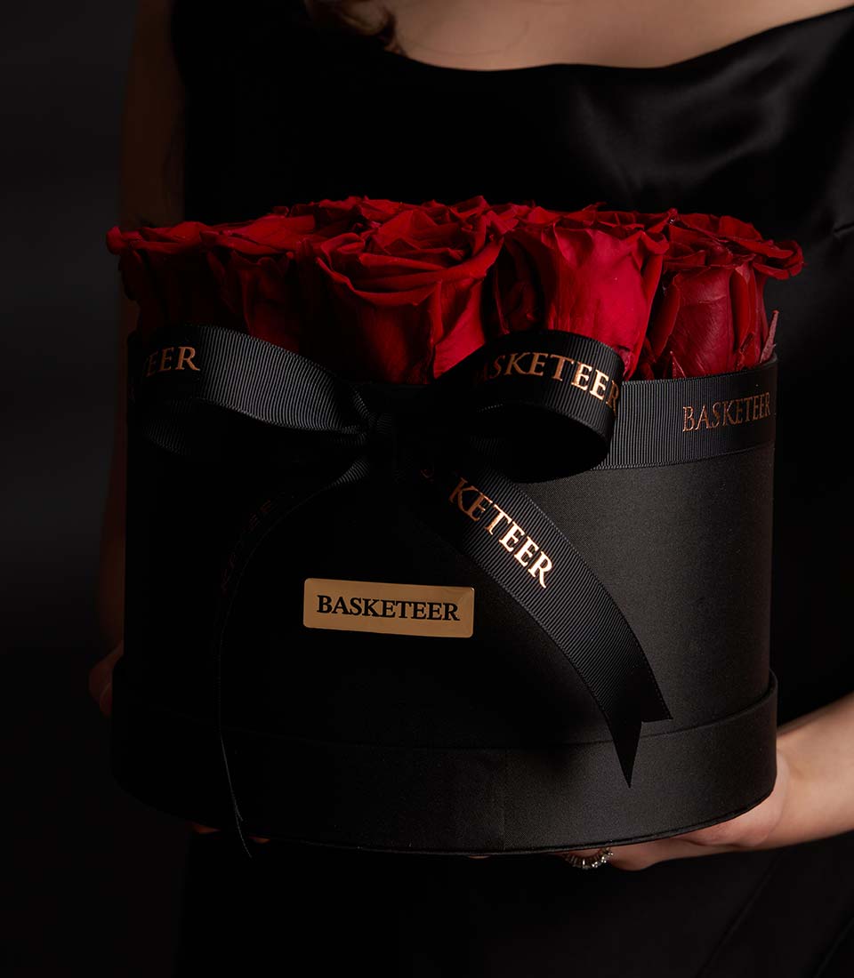 Luxury red preserved roses in black VIP round gift box with gold ribbon, Valentine's Day flowers