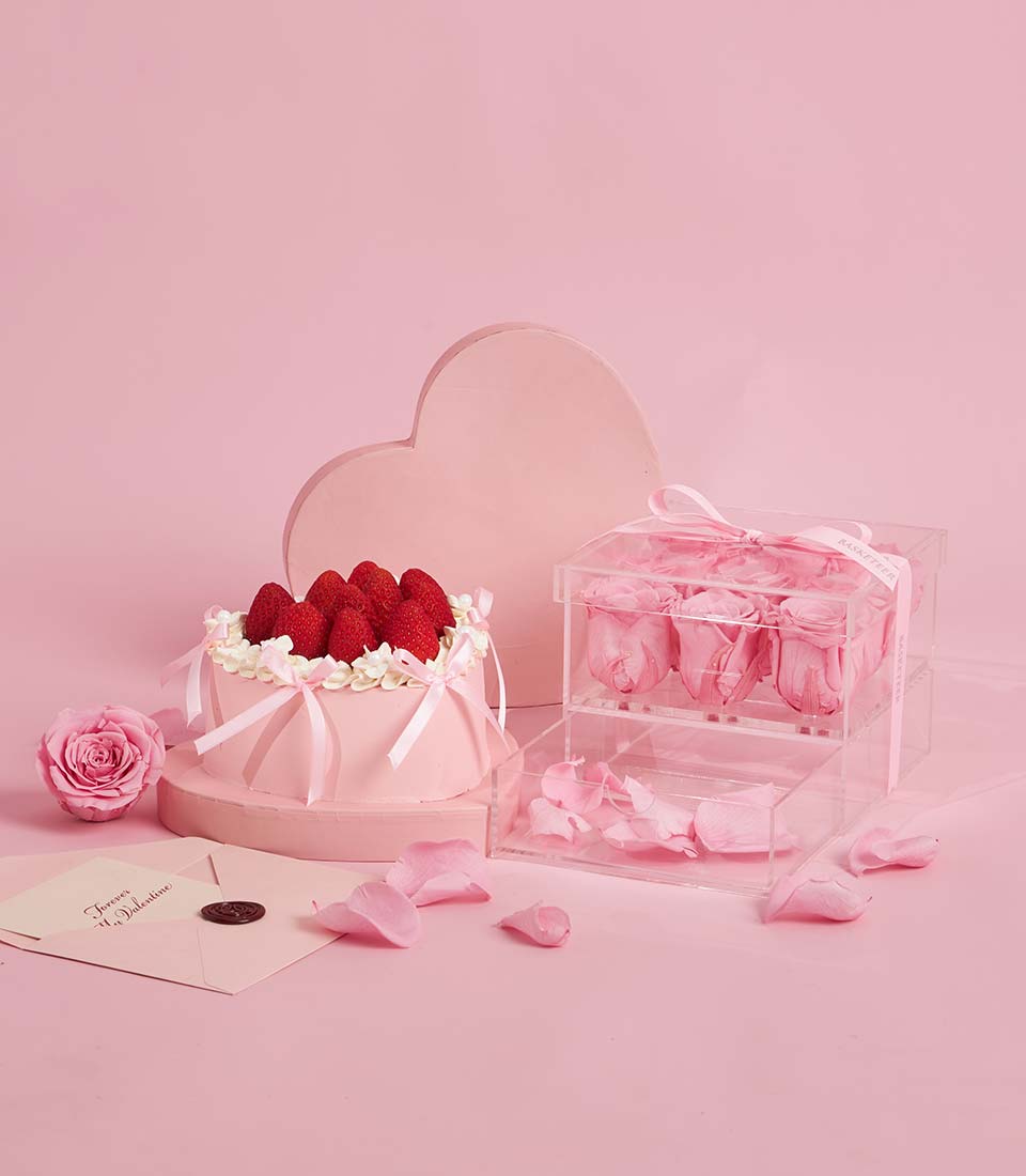 Pink roses and strawberry cake Valentine's Day gift set with fresh flowers and artisan dessert