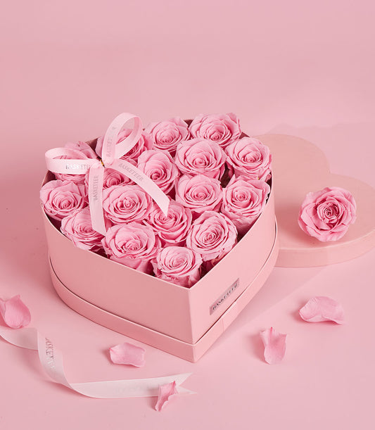 Preserved pink roses in heart-shaped luxury gift box, Valentine's Day flower gift with ribbon
