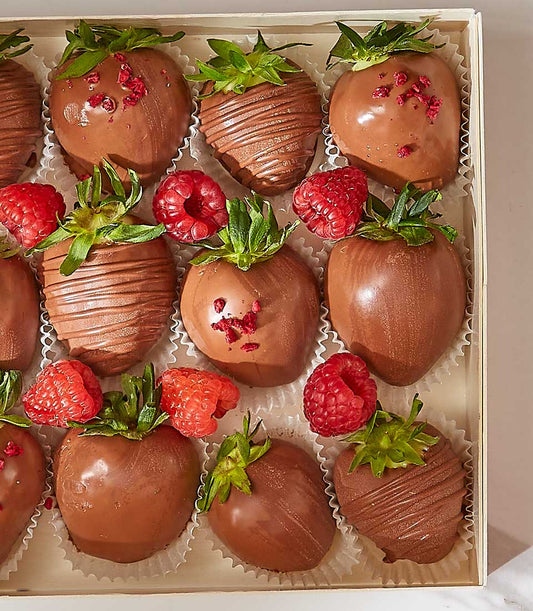 Milk chocolate-covered strawberries and raspberries in luxury gift box, Valentine's Day hamper