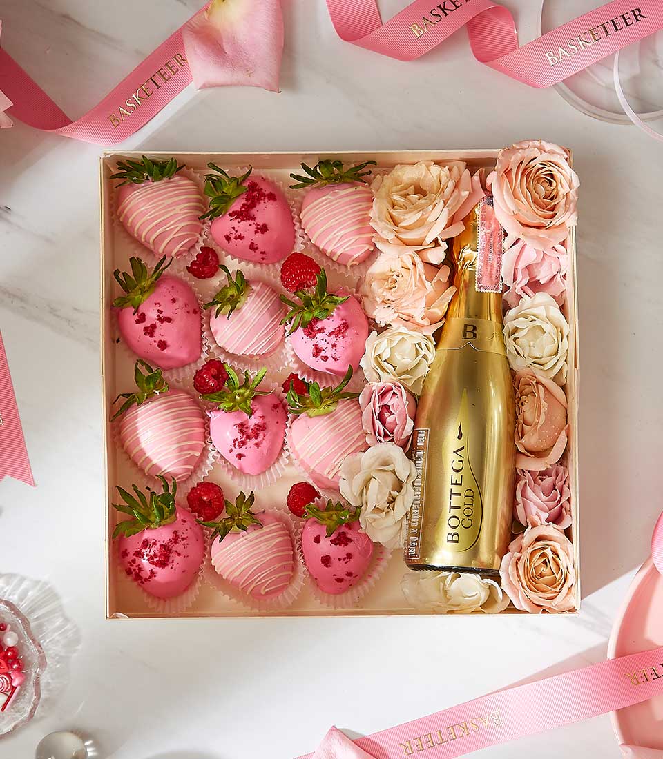 Luxury Valentine gift box with chocolate-dipped strawberries, Bottega Gold sparkling wine, and fresh cream roses