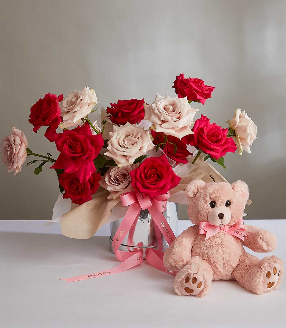 Red and pink rose bouquet with plush teddy bear gift set for birthday celebrations