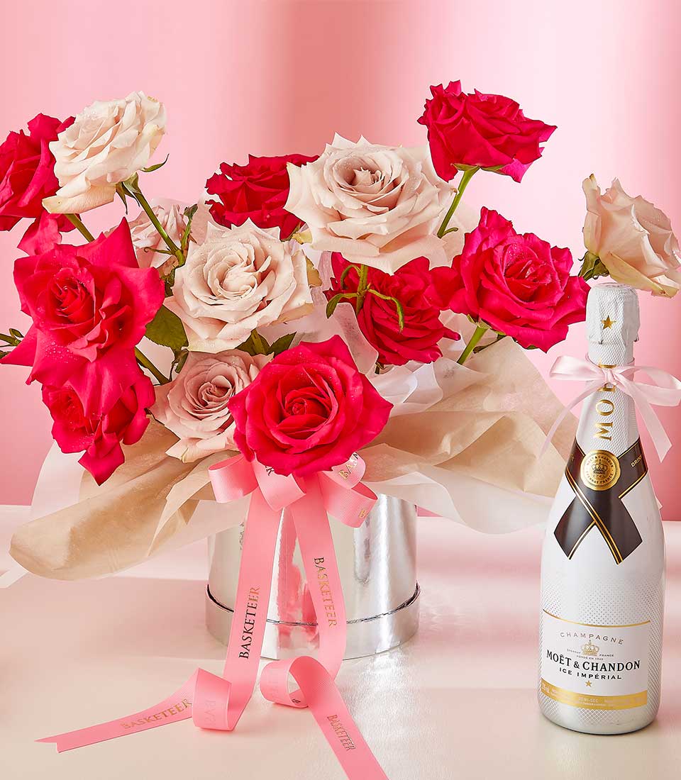 Red and blush rose bouquet with Moët & Chandon champagne, anniversary gift set with pink ribbons