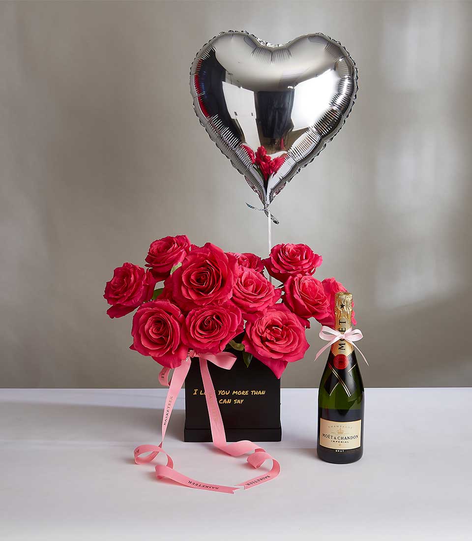 Pink roses in black box with champagne bottle and silver heart balloon Valentine gift set