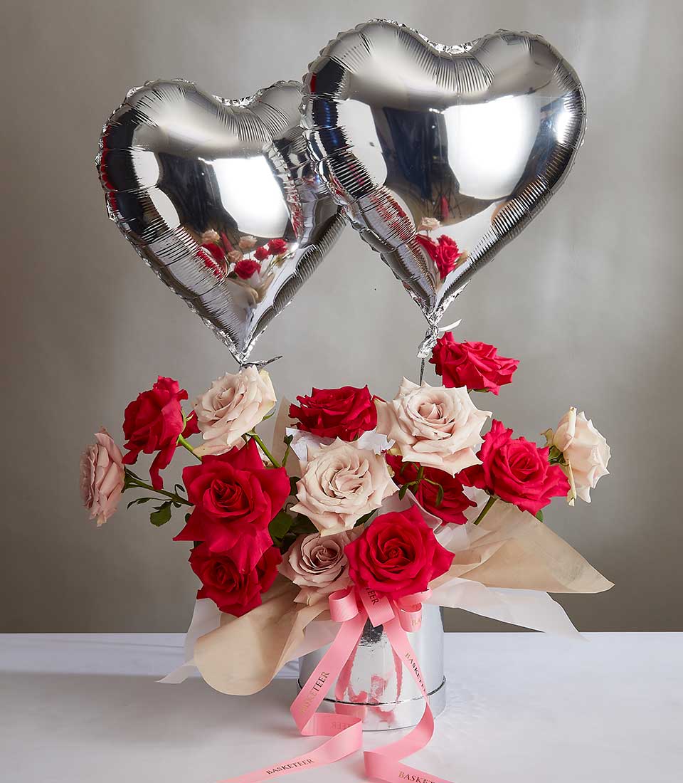 Sweet pink and red roses with silver heart balloons, romantic Valentine's Day gift set