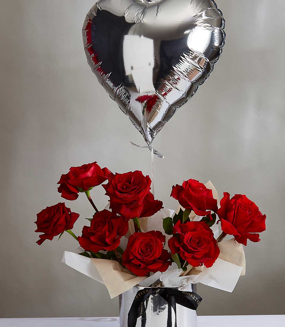 Red roses in silver vase with heart balloon, Valentine's Day gift for her