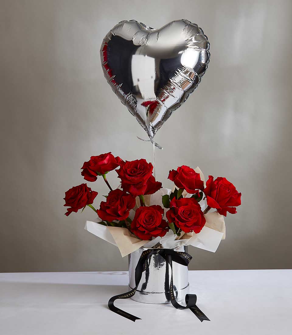 Red roses in silver vase with heart balloon, Valentine's Day gift for her