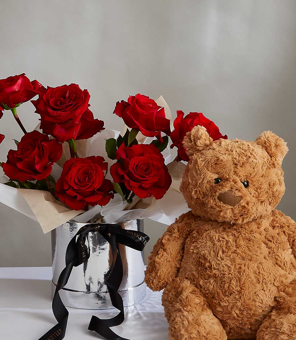 Ruby red roses with brown teddy bear in silver vase, Valentine's Day gift combo