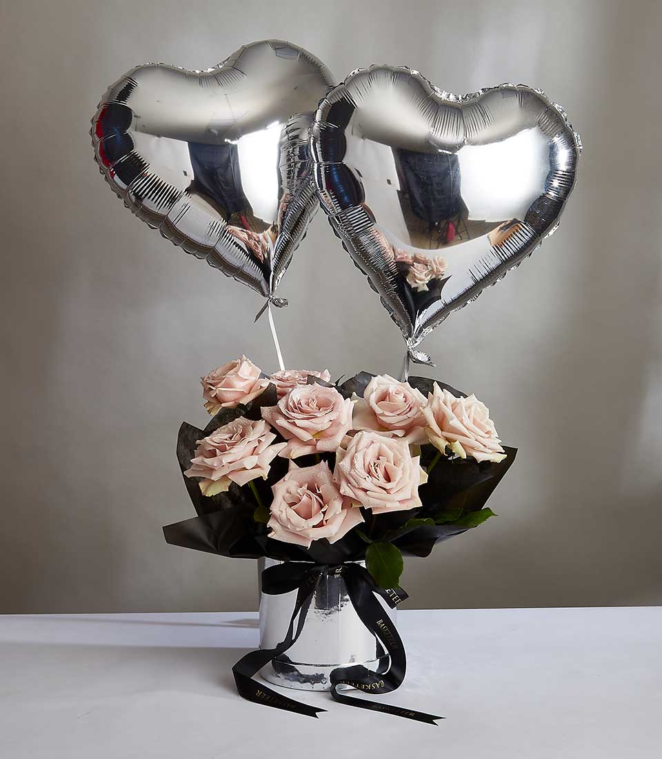 Light pink roses in silver vase with heart balloons, Valentine's Day romantic flower gift
