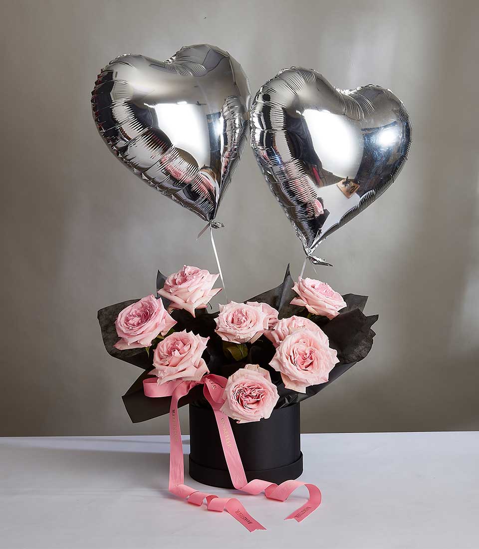 Luxury pink O'Hara roses in black gift box with heart balloons, Valentine's Day arrangement
