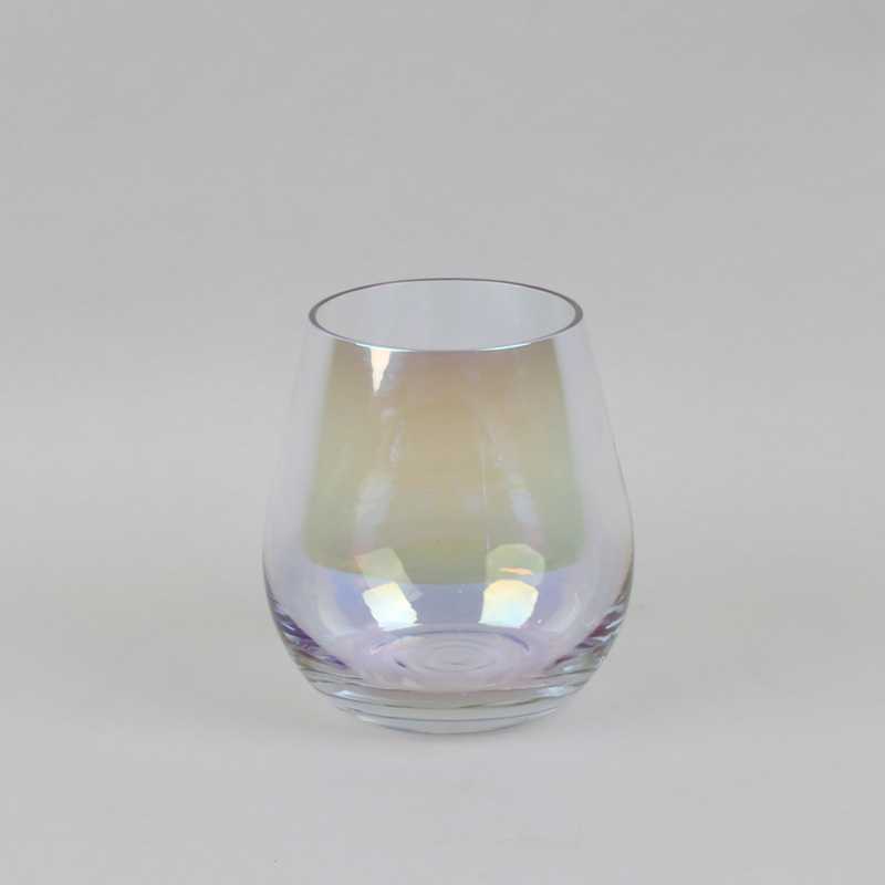 Iridescent glass vase with pearlescent finish in gold, green, and blue tones