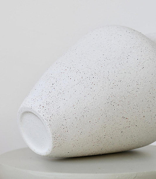 Minimalist white ceramic vase with speckled matte finish, artisan gift hamper accessory