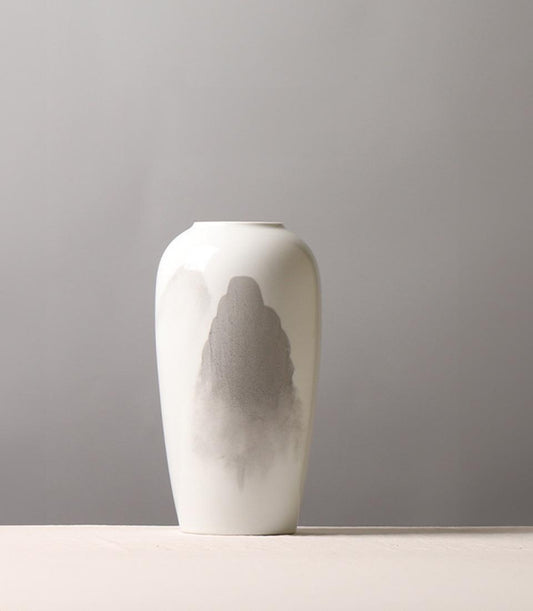 Minimalist white ceramic vase with abstract grey mountain landscape design