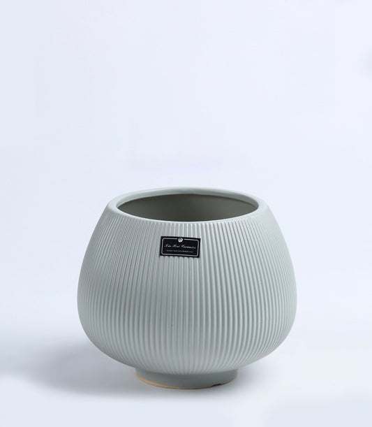 Light grey ceramic vase with ribbed texture and rounded bulbous form, perfect for fresh flowers or home décor gifting