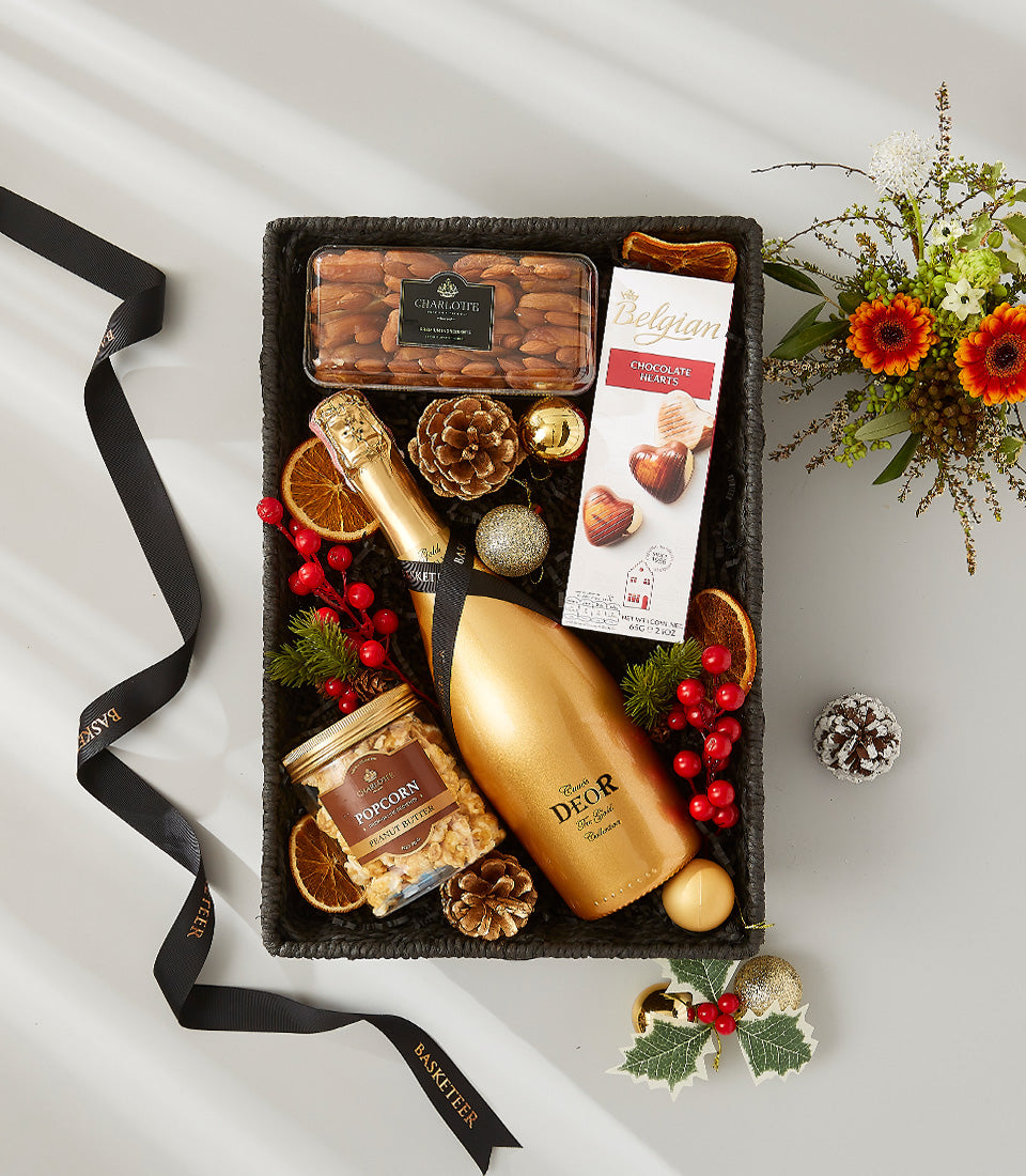Deor Gold Collection sparkling wine gift basket with Belgian chocolate, almonds, popcorn and festive holiday trimmings