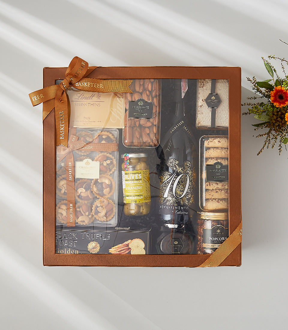 Appassimento 2023 red wine luxury gift box with Swiss chocolate, almonds, honeycomb, olives and gourmet treats