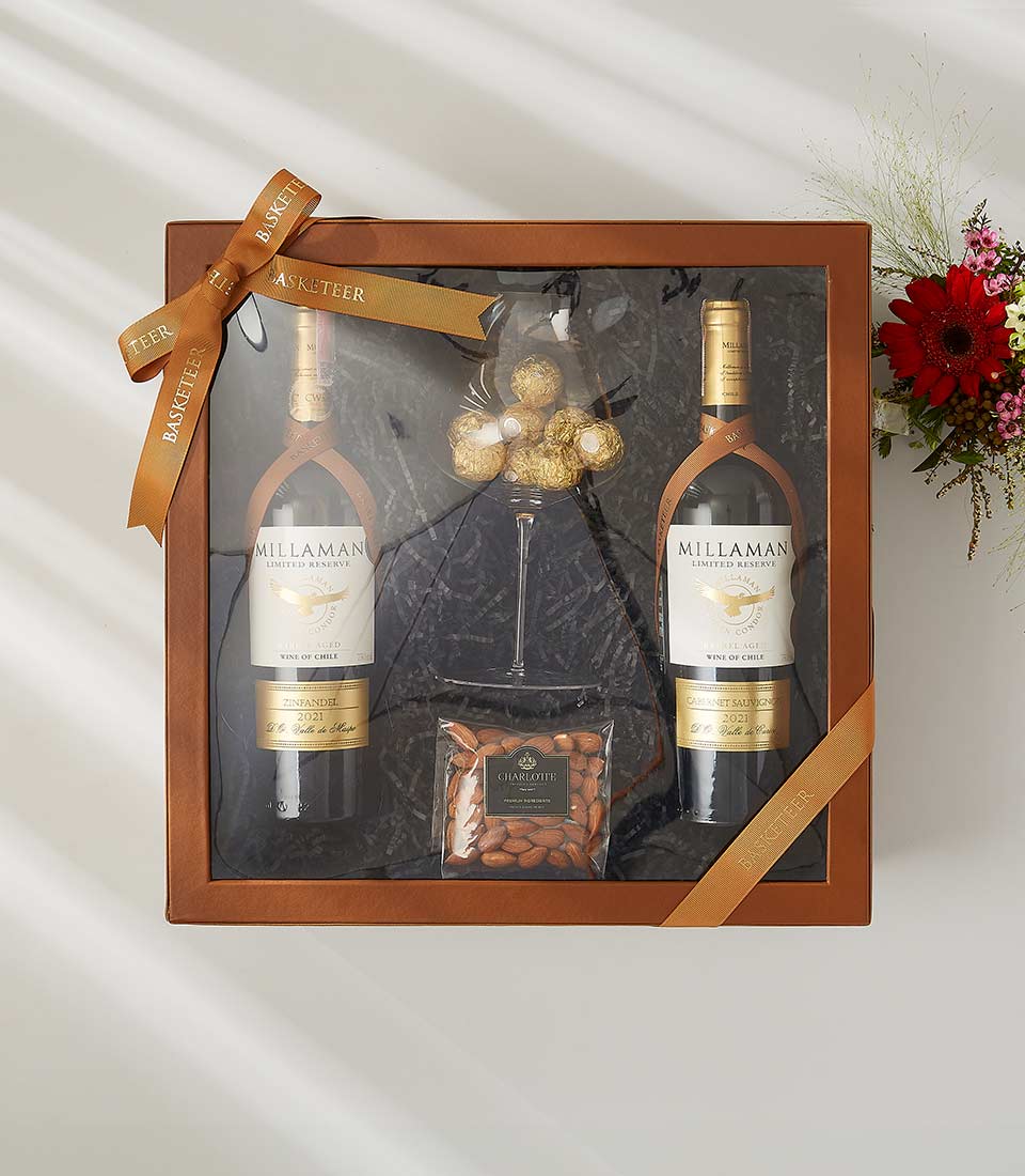 Premium wine gift duo with Millaman Zinfandel and Cabernet Sauvignon, chocolates, and almonds in luxury brown box with ribbon